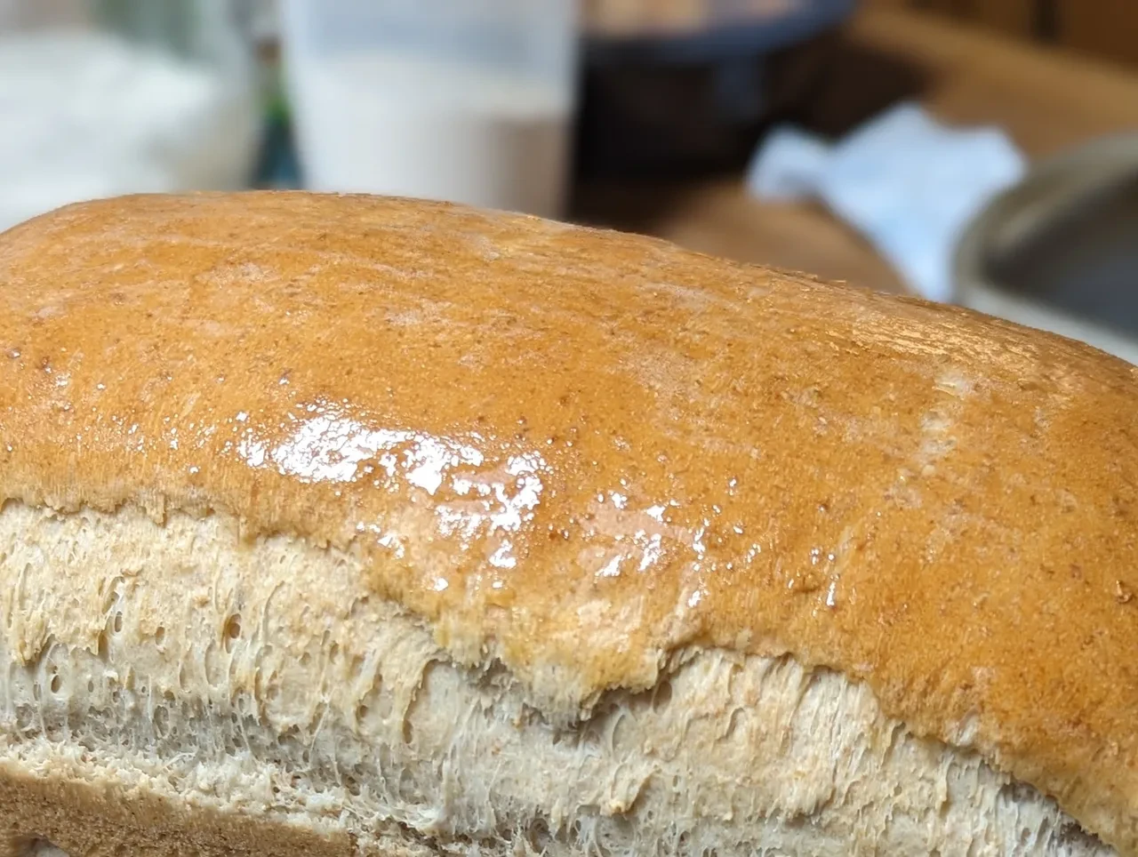 Close-up of a golden artisan bread loaf fresh from the oven